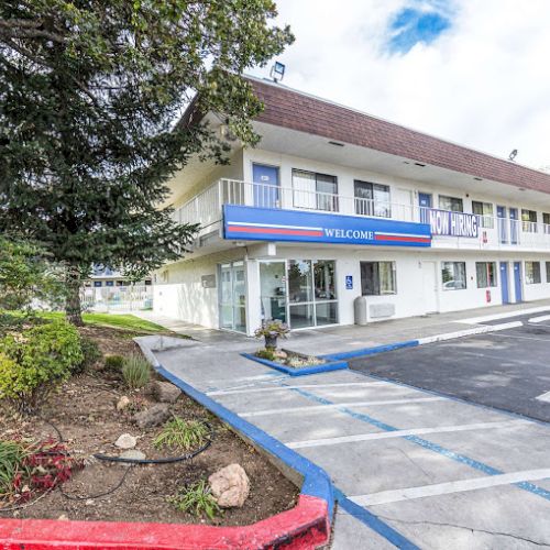 A two-story motel building with a 